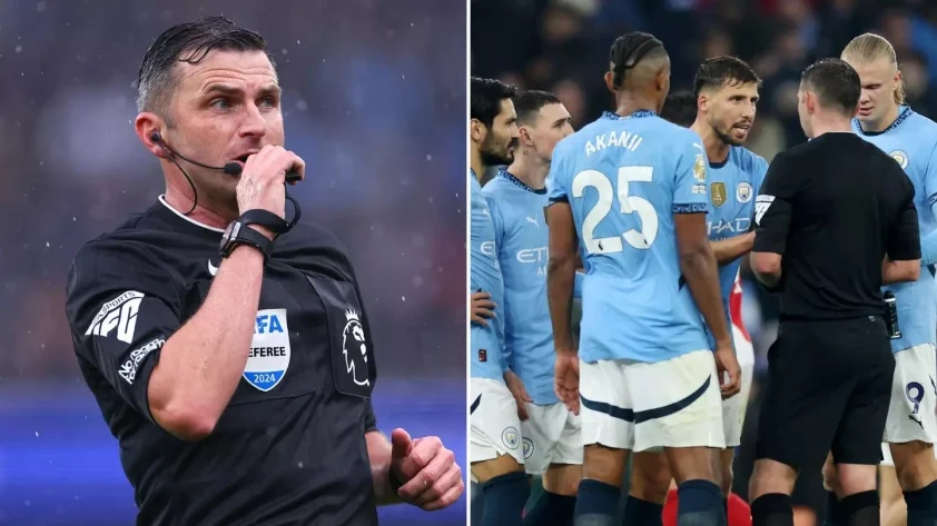 Các cầu thủ của Man City tỏ ra rất tức giận với trọng tài Michael Oliver (Ảnh: Getty).